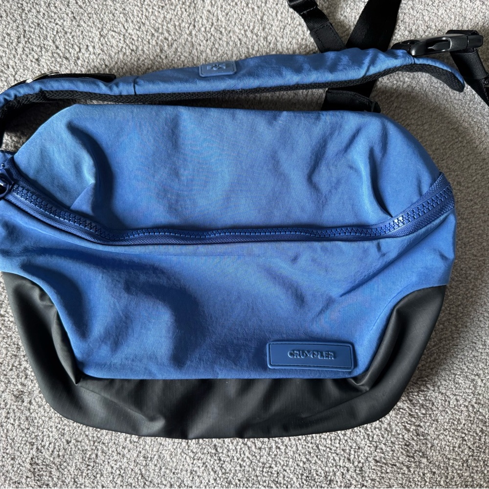 Crumpler “the adaptive limb” sling bag - blue and black